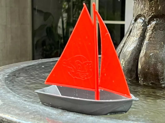 MARX TOYS REISSUE SAILBOAT RECAST. 2 pieces. 6 inches long, 6.5 inches tall.